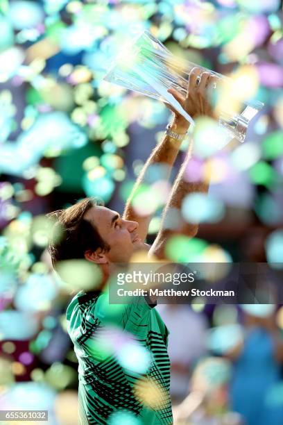 Roger Federer of Switzerland celebrates his win over Stan Wawrinka of Switzerland during the men's final of the BNP Paribas Open at the Indian Wells...