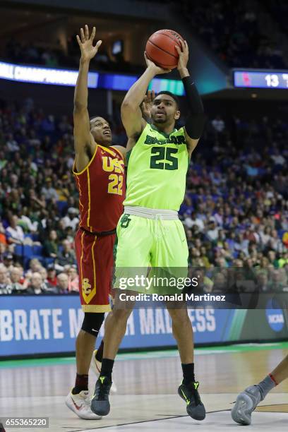 Al Freeman of the Baylor Bears attempts a shot defended by De'Anthony Melton of the USC Trojans during the second round of the 2017 NCAA Men's...