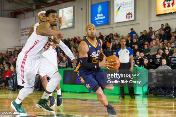 Sundiata Gaines of the Salt Lake City Stars drives around Jordan Mickey of the Maine Red Claws on Sunday, March 19, 2017 at the Portland Expo in...