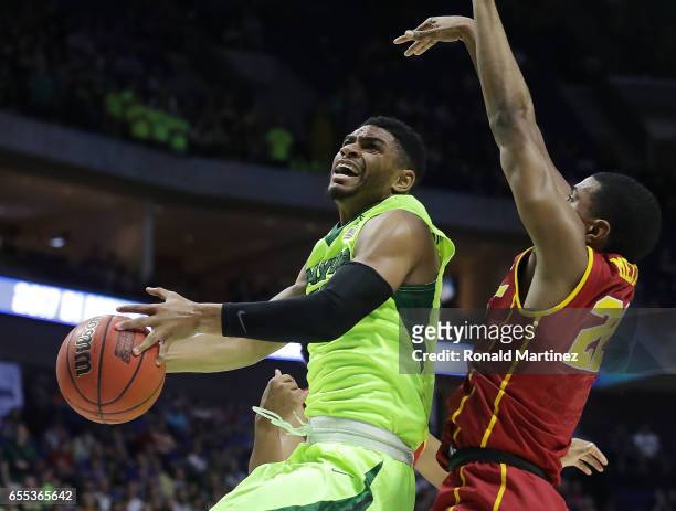 Al Freeman of the Baylor Bears attempts a shot defended by De'Anthony Melton of the USC Trojans during the second round of the 2017 NCAA Men's...