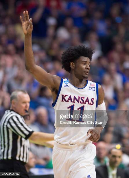 Kansas Jayhawks guard Josh Jackson celebrates a three-pointer in the first half against Michigan State during a second round NCAA men's basketball...