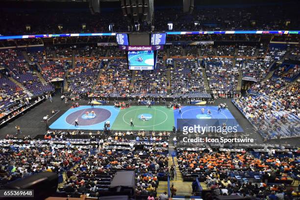 An overall view of the NCAA Wrestling Championships with three mats in use for the consolation rounds on March 18 at Scottrade Center in St. Louis,...