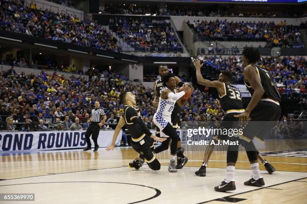 De'Aaron Fox of Kentucky shoots on Wichita State University during the 2017 NCAA Photos via Getty Images Men's Basketball Tournament held at Bankers...