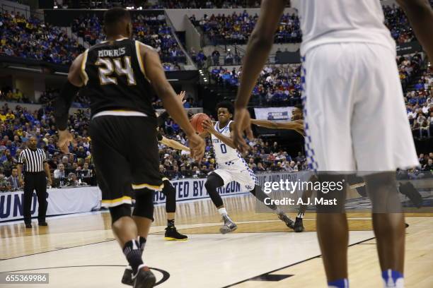 De'Aaron Fox of Kentucky drives whle playing Wichita State University during the 2017 NCAA Photos via Getty Images Men's Basketball Tournament held...