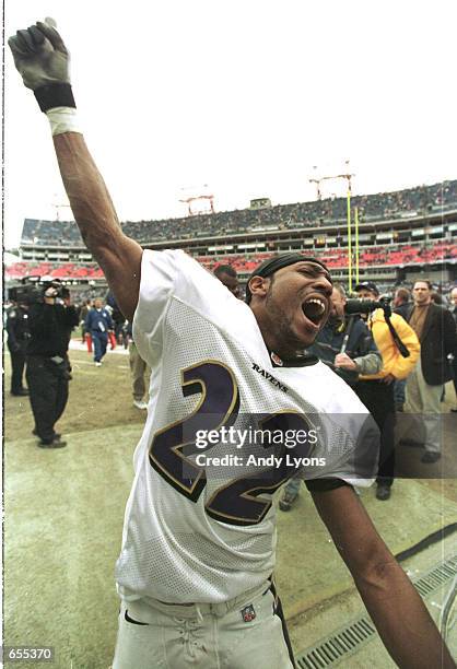 Duane Starks of the Baltimore Ravens celebrates after the end of the game during the Ravens v Titans AFC Playoff game at Adelphia Coliseum in...