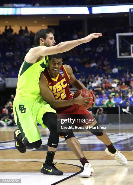 De'Anthony Melton of the USC Trojans is defended by Jake Lindsey of the Baylor Bears during the second round of the 2017 NCAA Men's Basketball...