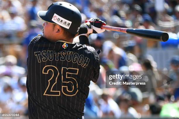 Yoshitomo Tsutsugo of Japan hits the double during the exhibition game between Japan and Los Angeles Dodgers at Camelback Ranch on March 19, 2017 in...