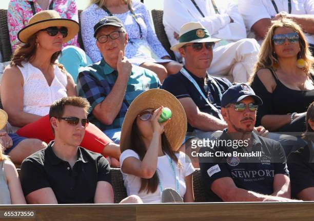 Bill Gates and Larry Ellison watch Roger Federer of Switzerland as he plays against Stanislas Wawrinka of Switzerland in the mens final during day...