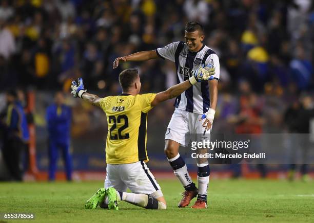 Guido Herrera and Victor Ramis of Talleres celebrate after winning a match between Boca Juniors and Talleres as part of Torneo Primera Division...