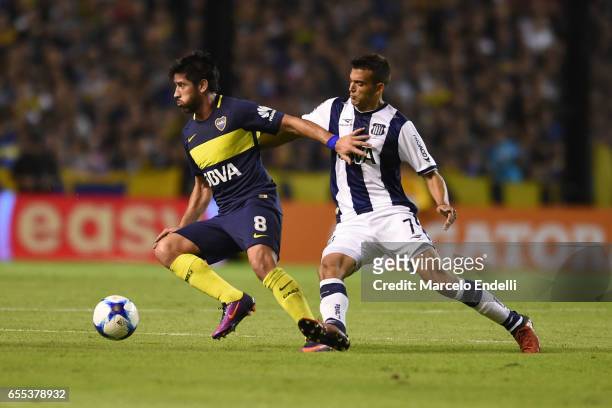 Pablo Perez of Boca Juniors fights for ball with Victor Ramis of Talleres during a match between Boca Juniors and Talleres as part of Torneo Primera...