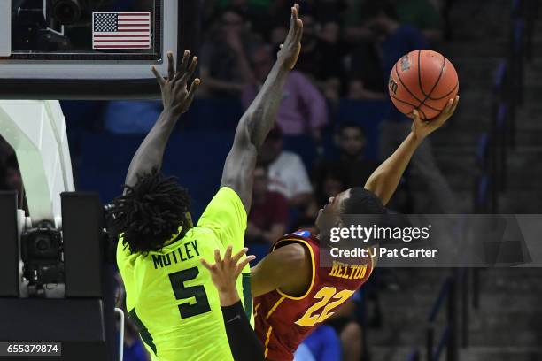 De'Anthony Melton of the USC Trojans is defended by Johnathan Motley of the Baylor Bears during the second round of the 2017 NCAA Men's Basketball...
