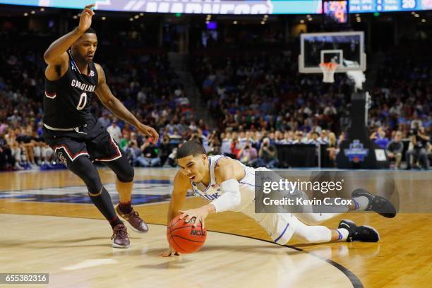 Jayson Tatum of the Duke Blue Devils trips in the first half against the South Carolina Gamecocks during the second round of the 2017 NCAA Men's...