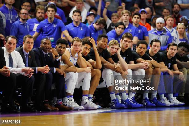 The Duke Blue Devils bench reacts in the second half against the South Carolina Gamecocks during the second round of the 2017 NCAA Men's Basketball...