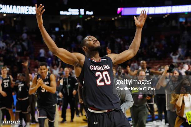 Justin McKie of the South Carolina Gamecocks celebrates defeating the Duke Blue Devils 88-81 in the second round of the 2017 NCAA Men's Basketball...