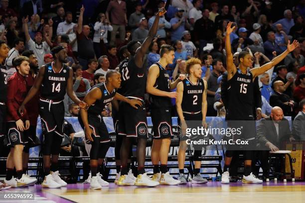 The South Carolina Gamecocks bench reacts in the second half against the Duke Blue Devils during the second round of the 2017 NCAA Men's Basketball...