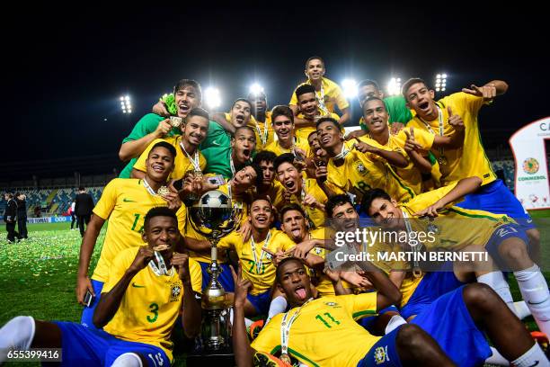 Brazil´s players celebrate with the trophy their first place finish in the South American U-17 football tournament in Rancagua, some 90 km south of...