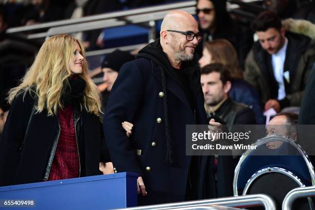 French singer Pascal Obispo and his wife Julie Hantson during the French Ligue 1 match between Paris Saint Germain and Lyon at Parc des Princes on...