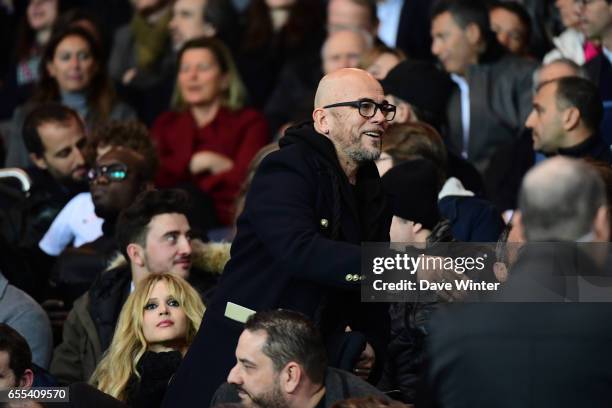 French singer Pascal Obispo and his wife Julie Hantson during the French Ligue 1 match between Paris Saint Germain and Lyon at Parc des Princes on...