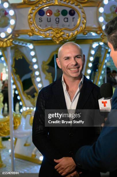 Rapper Pitbull speaks to the press at Sugar Factory American Brasserie at the Fashion Show mall announcing the launch of his Voli 305 vodka brand's...