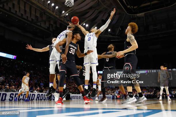 Jayson Tatum of the Duke Blue Devils battles for a rebonud in the second half against the South Carolina Gamecocks during the second round of the...