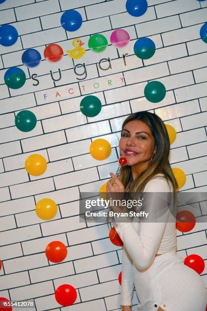 Miss BumBum 2017 Liziane Gutierrez appears at Sugar Factory American Brasserie at the Fashion Show mall as Pitbull's Voli 305 vodka brand's exclusive...