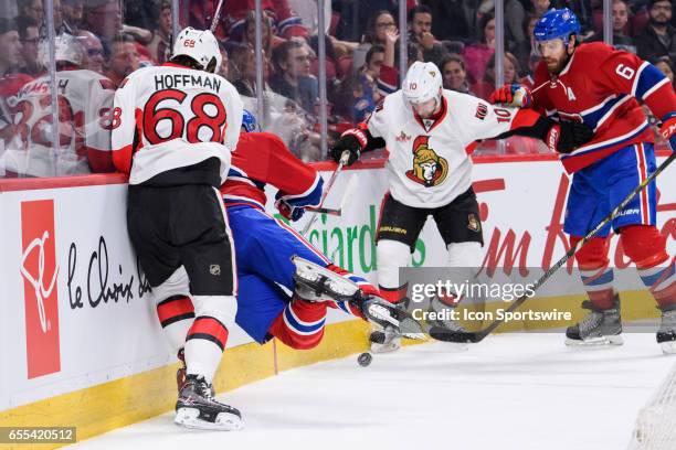 Ottawa Senators left wing Mike Hoffman checks Montreal Canadiens center Tomas Plekanec during the second period of the NHL regular season game...