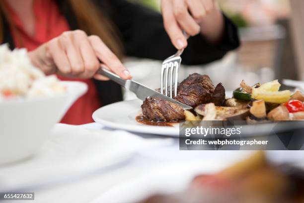 eating steak - steak stock pictures, royalty-free photos & images