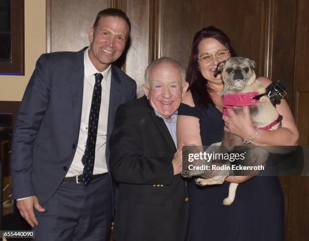 Tailwaggers Founder and President Todd Warner, actor Leslie Jordan, and Pug Nation Rescue's Bella the Pug pose for portrait at The Tailwaggers...