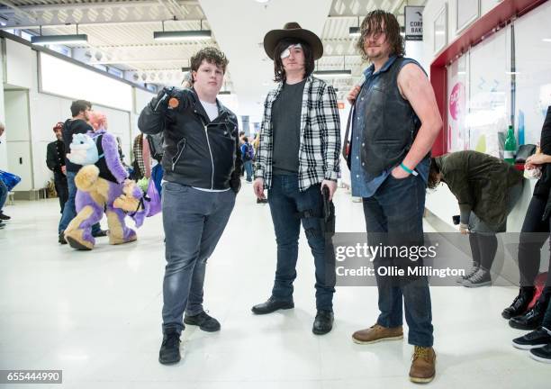 Cosplayers in character as Negan, Carl and Daryl Dixon from The Walking Dead during the MCM Birmingham Comic Con at NEC Arena on March 19, 2017 in...