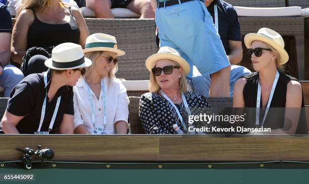 Actress Charlize Theron her mother Gerda Jacoba Aletta Maritz producer Megan Ellison and director Drew Denny attend the women's mens finals during...