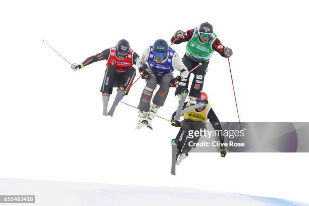 Jamie Pebble of New Zealand leads Brady Leman of Canada, Francois Place of Frace and Siegmar Klotz of Italy during the Men's Ski Cross Finals on day...