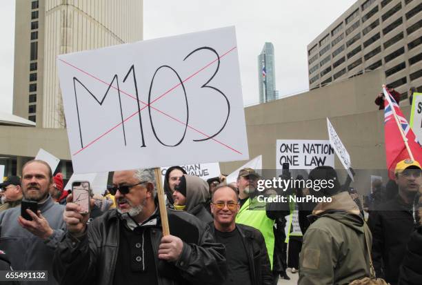 Group of Canadians gathered to protest against Islam, Muslims, Sharia Law and M-103 in downtown Toronto, Ontario, Canada, on March 19, 2017....