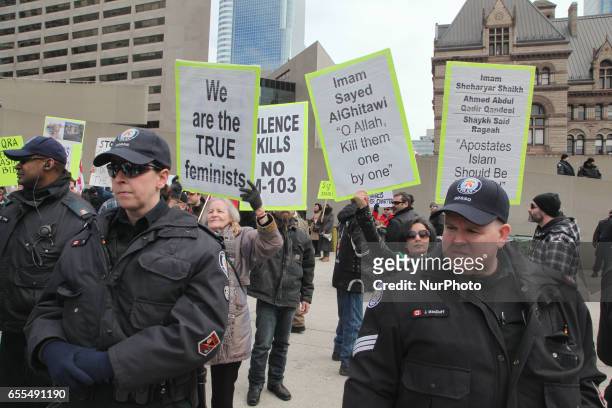 Group of Canadians gathered to protest against Islam, Muslims, Sharia Law and M-103 in downtown Toronto, Ontario, Canada, on March 19, 2017....