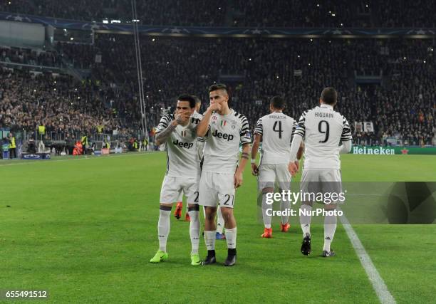 Dani Alves and Paulo Dybala of Juventus during the Uefa Champions League 2016-2017 match between FC Juventus and FC Porto at Juventus Stadium on...