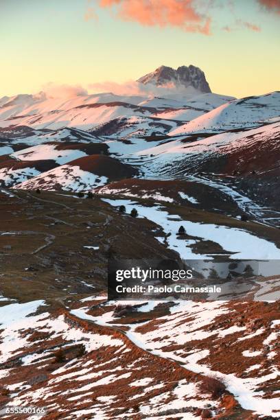 the corno grande peak in the snow - rocca calascio stock pictures, royalty-free photos & images