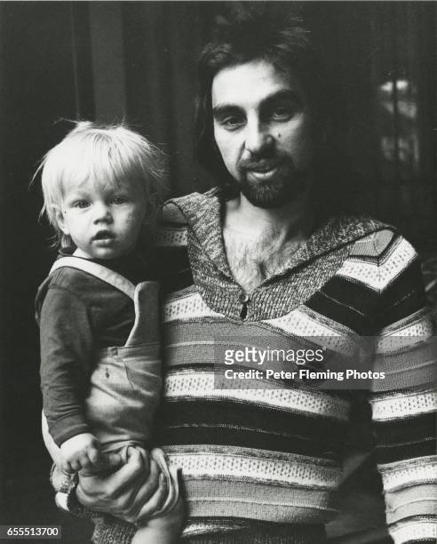 Leonardo DiCaprio being held by his father George DiCaprio outside their home in Hollywood, California, circa January 1976. JHyams