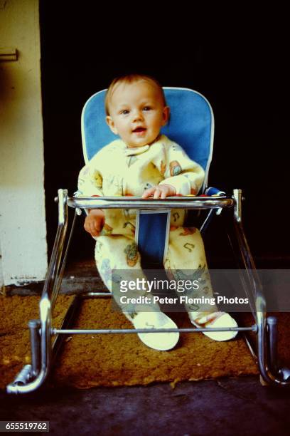 Los Angeles July 1975 Leonardo DiCaprio sitting in baby seat Posing for a portrait in his home in Hollywood California.
