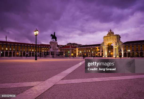 praca do comercio at dusk - lisbon architecture stock pictures, royalty-free photos & images