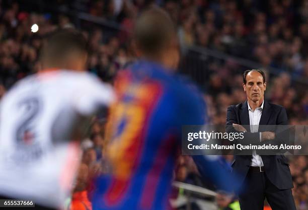 Valencia CF manager Voro Gonzalez looks on during the La Liga match between FC Barcelona and Valencia CF at Camp Nou Stadium on March 19, 2017 in...