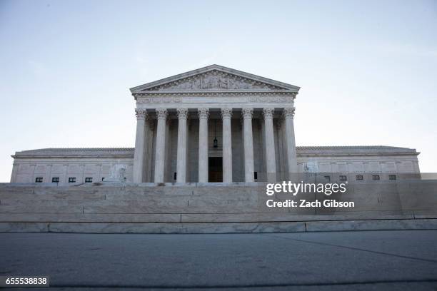 Morning light shines outside The United States Supreme Court building on March 20, 2017 in Washington, D.C. The Senate will hold a confirmation...