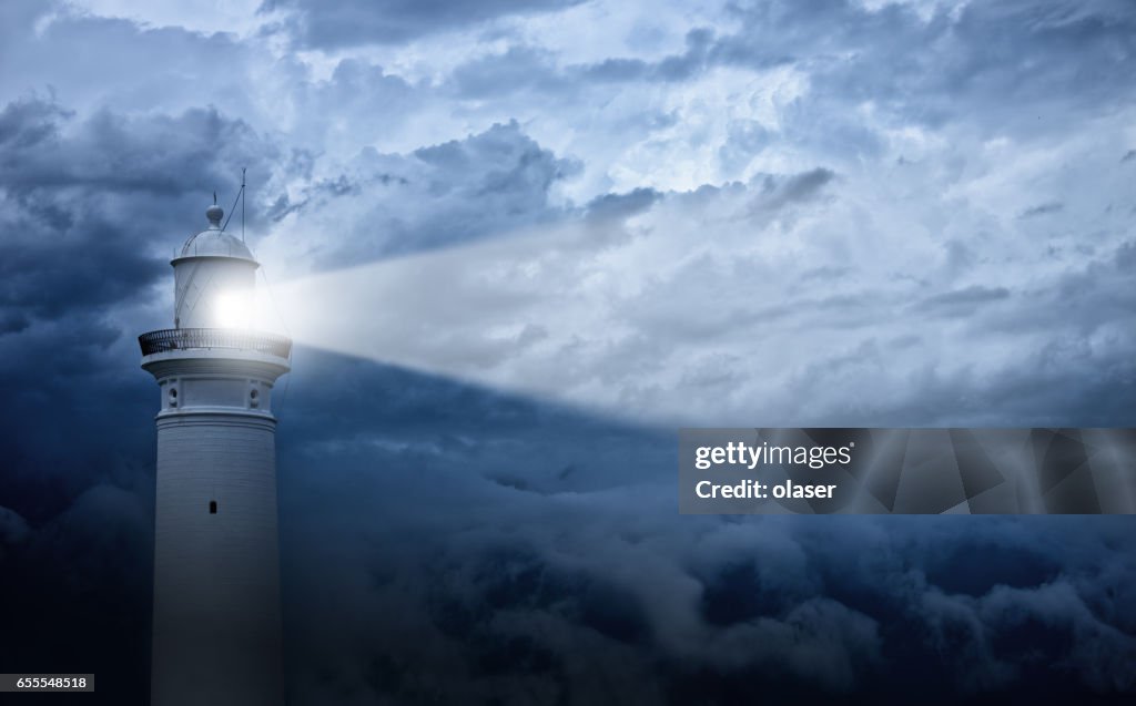 Lighthouse and bad weather in background