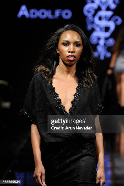 Model walks the runway wearing Adolfo Sanchez at the Art Hearts Fashion LAFW Fall/Winter 2017-Day 4 at The Beverly Hilton Hotel on March 17, 2017 in...