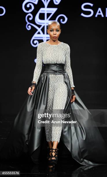 Model walks the runway wearing Adolfo Sanchez at the Art Hearts Fashion LAFW Fall/Winter 2017-Day 4 at The Beverly Hilton Hotel on March 17, 2017 in...