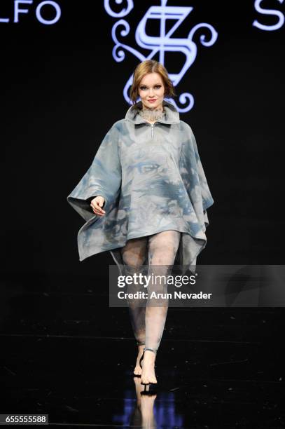 Model walks the runway wearing Adolfo Sanchez at the Art Hearts Fashion LAFW Fall/Winter 2017-Day 4 at The Beverly Hilton Hotel on March 17, 2017 in...