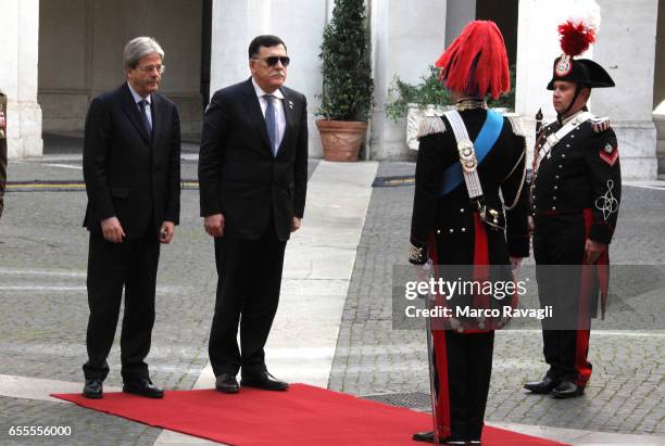 Italian Prime Minister Paolo Gentiloni welcomes Libyan Prime Minister Fayez al-Sarraj for a meeting at the Chigi Palace on March 20, 2017 in Rome,...