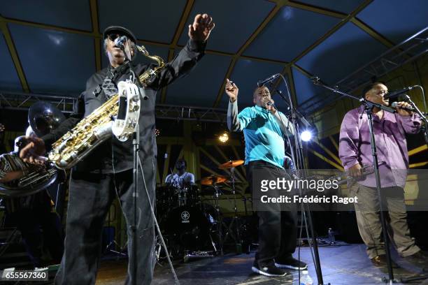 Kevin Harris, Gregory Davis and Efrem Towns of the Dirty Dozen Brass Band perform at Maison Elsa Triolet-Aragon on March 19, 2017 in...