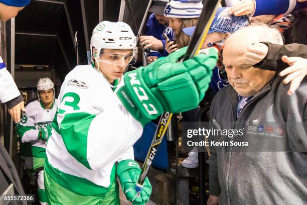 Alexey Marchenko of the Toronto Maple Leafs is surrounded by fans prior at an NHL game against the Chicago Blackhawks at the Air Canada Centre on...