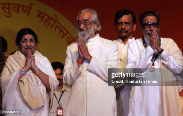 Playback singer Lata Mangeshkar, Babasaheb Purandare, Bal Thackeray at the Golden Jubilee celebrations of Maharashtra at a Shiv Sena event at Bandra...