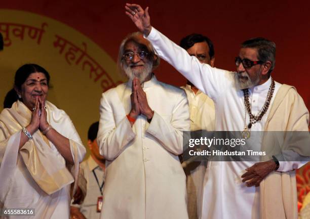 Playback singer Lata Mangeshkar, Babasaheb Purandare, Bal Thackeray at the Golden Jubilee celebrations of Maharashtra at a Shiv Sena event at Bandra...