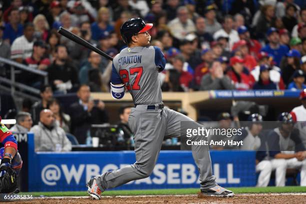 Giancarlo Stanton of Team USA hits a two-run home run in the top of the fourth inning of Game 6 of Pool F of the 2017 World Baseball Classic against...